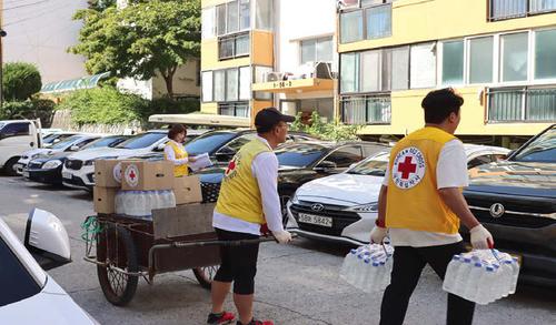 강릉 가뭄 극복의 숨은 주역들, 물과 마음을 나눈 봉사원들